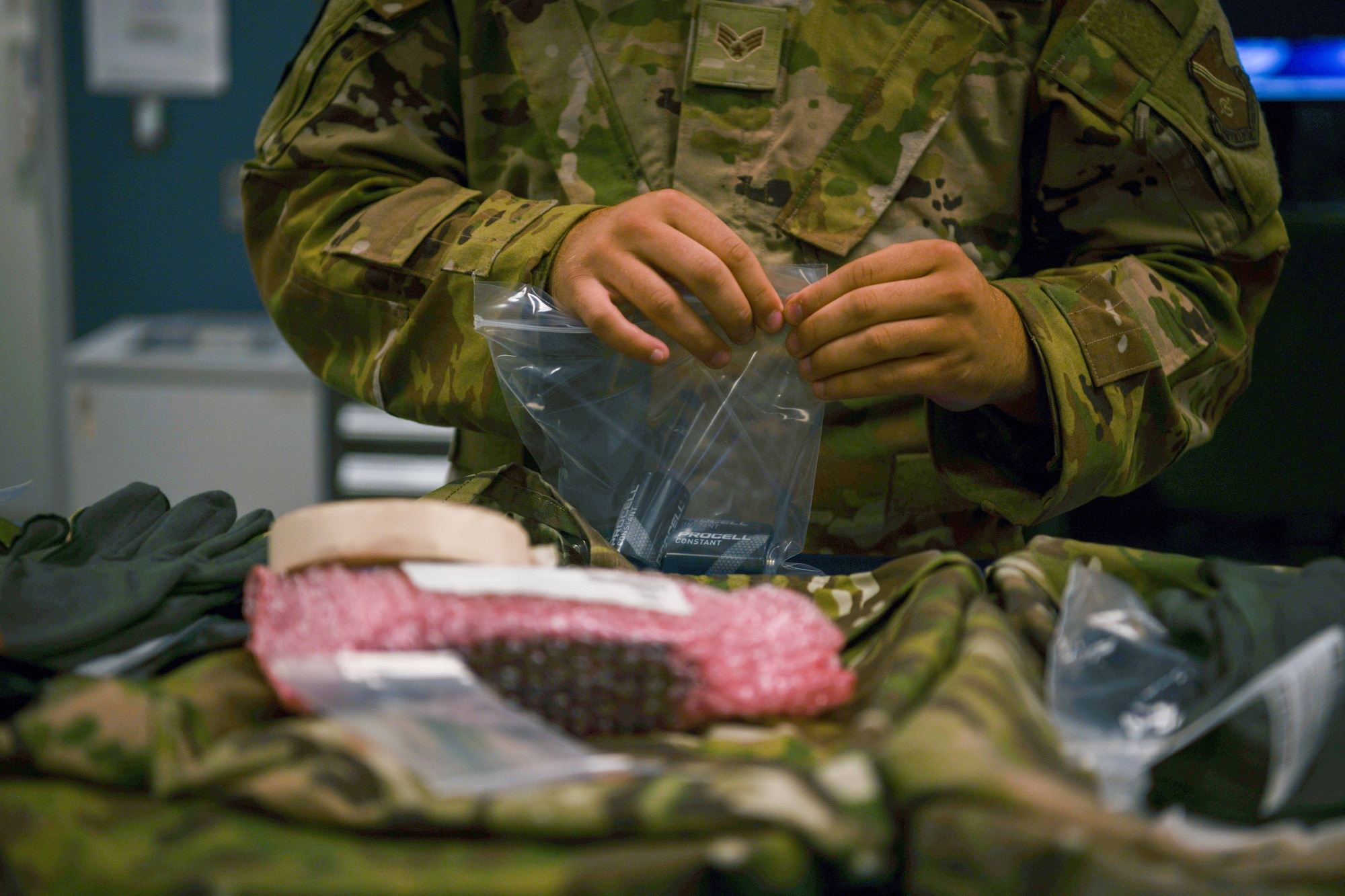 Service member builds a flight bag.