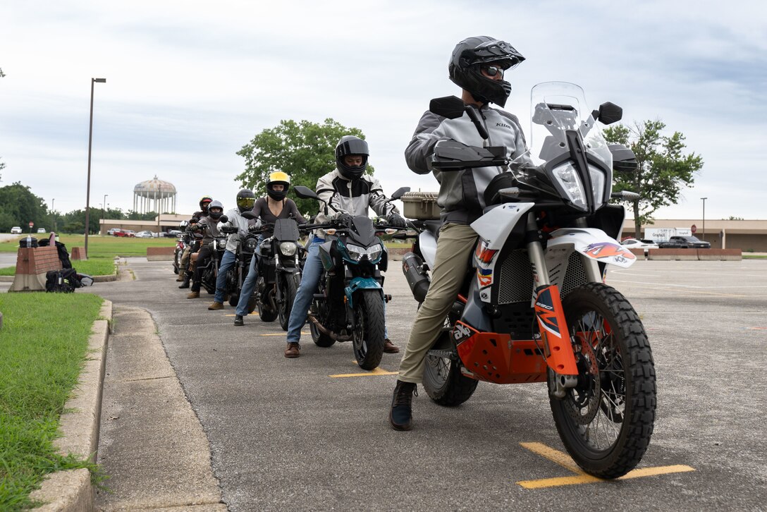 Motorcycle riders, attending the Basic RiderCourse 2, line up before a drill at Joint Base Andrews, Md., July 21, 2025.