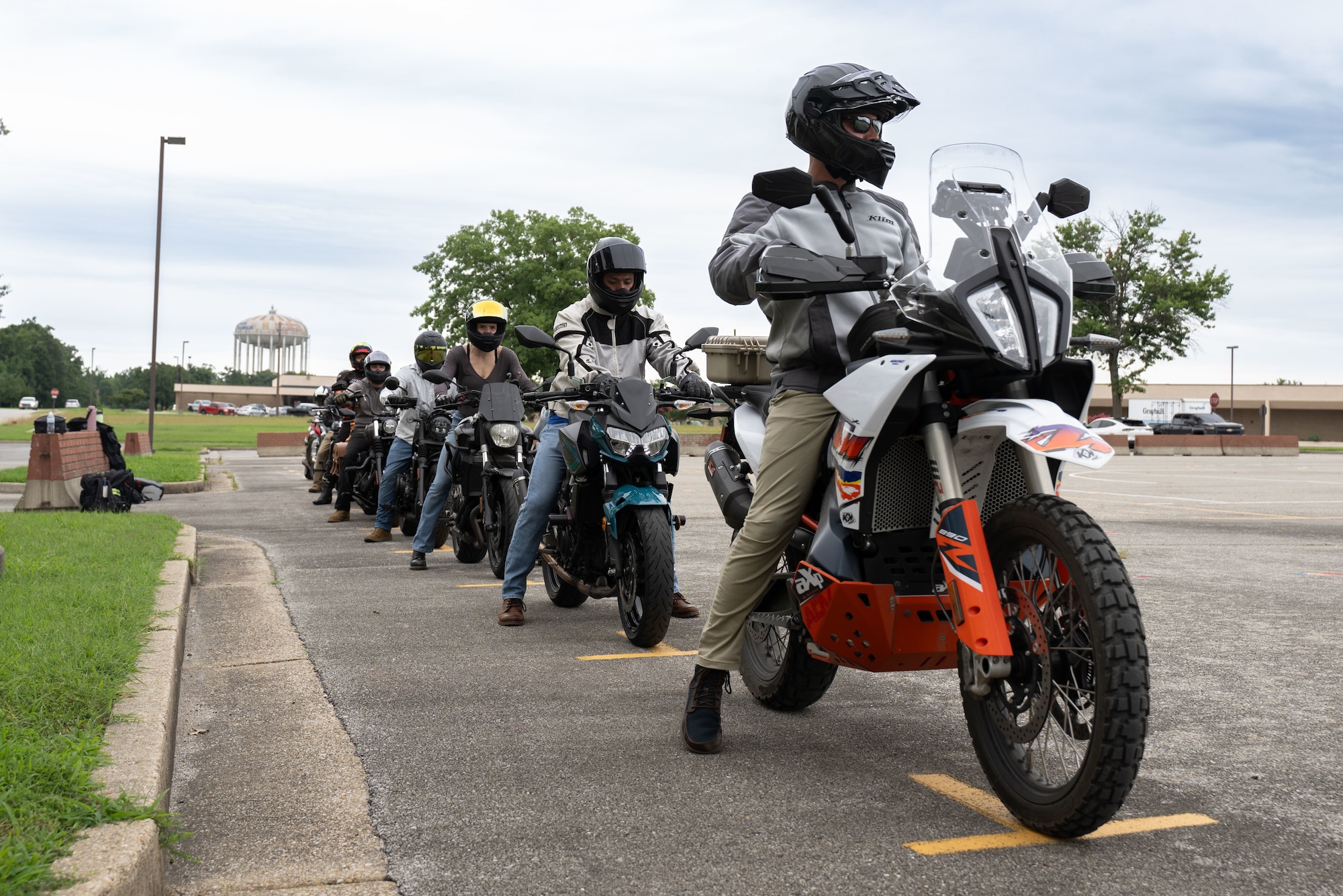Motorcycle riders, attending the Basic RiderCourse 2, line up before a drill at Joint Base Andrews, Md., July 21, 2025.