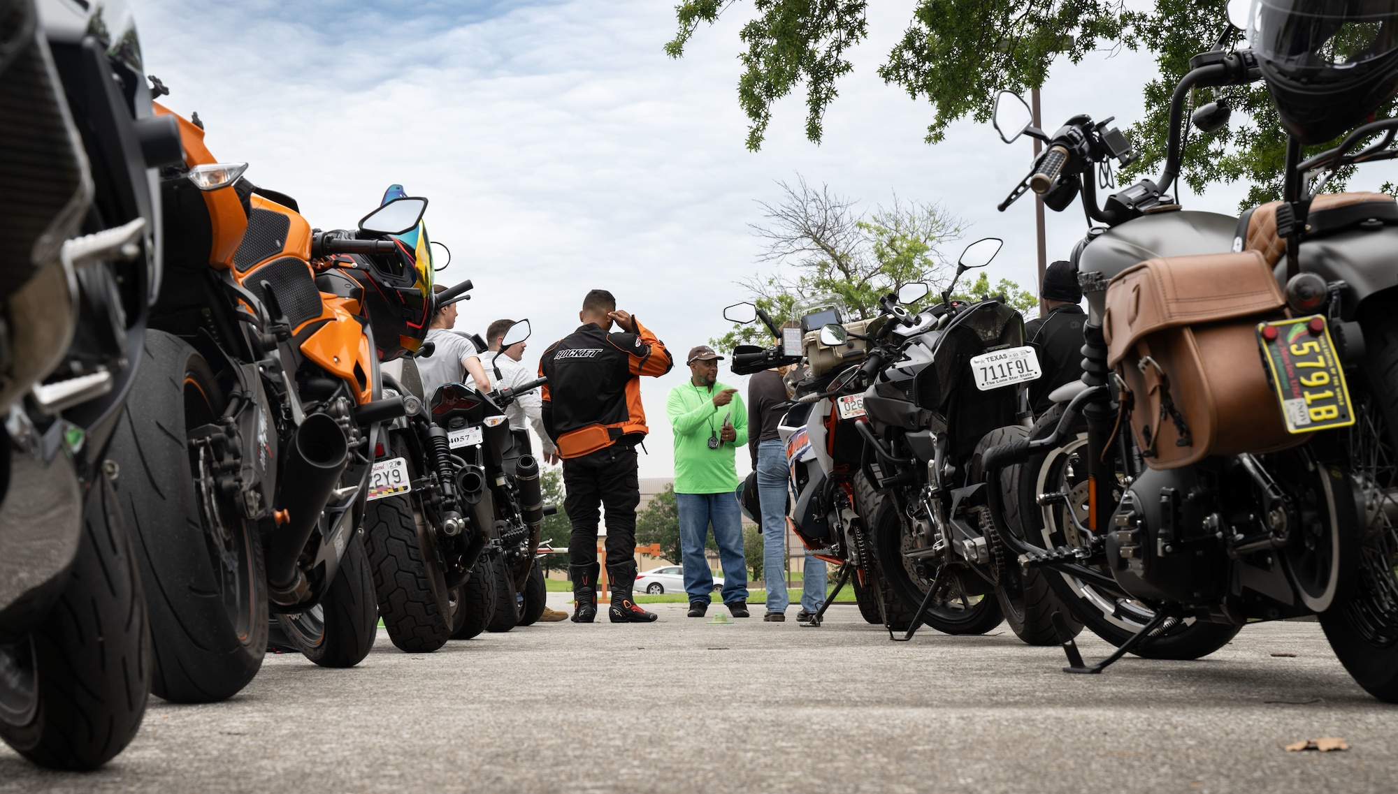 Daryl Bagley, Air Force District of Washington senior Motorcycle Safety Foundations rider coach, provides feedback to riders during the Basic RiderCourse 2 at Joint Base Andrews, Md., July 21, 2025.
