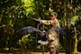 A U.S. Army soldier demonstrates the proper technique for safely handling an eagle, educating U.S. and Australian Army partners on the importance of wildlife awareness and respectful interaction during jungle survival training July 20, 2025.