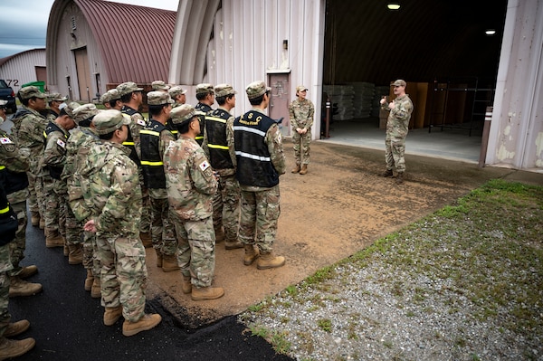 U.S. Airmen assigned to the 51st Mission Support Group brief members of the Korean Service Corps Battalion during a bilateral logistics and transportation training event at Osan Air Base, Republic of Korea, July 17, 2025.
