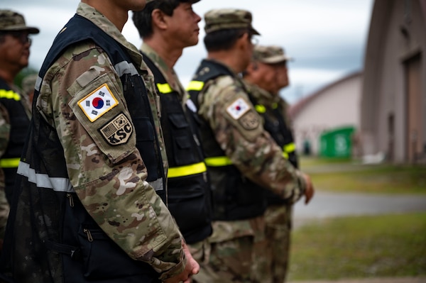 Korean Service Corps Battalion receive joint training by U.S. Air Force members during a bilateral logistics and transportation training event at Osan Air Base, Republic of Korea, July 17, 2025.