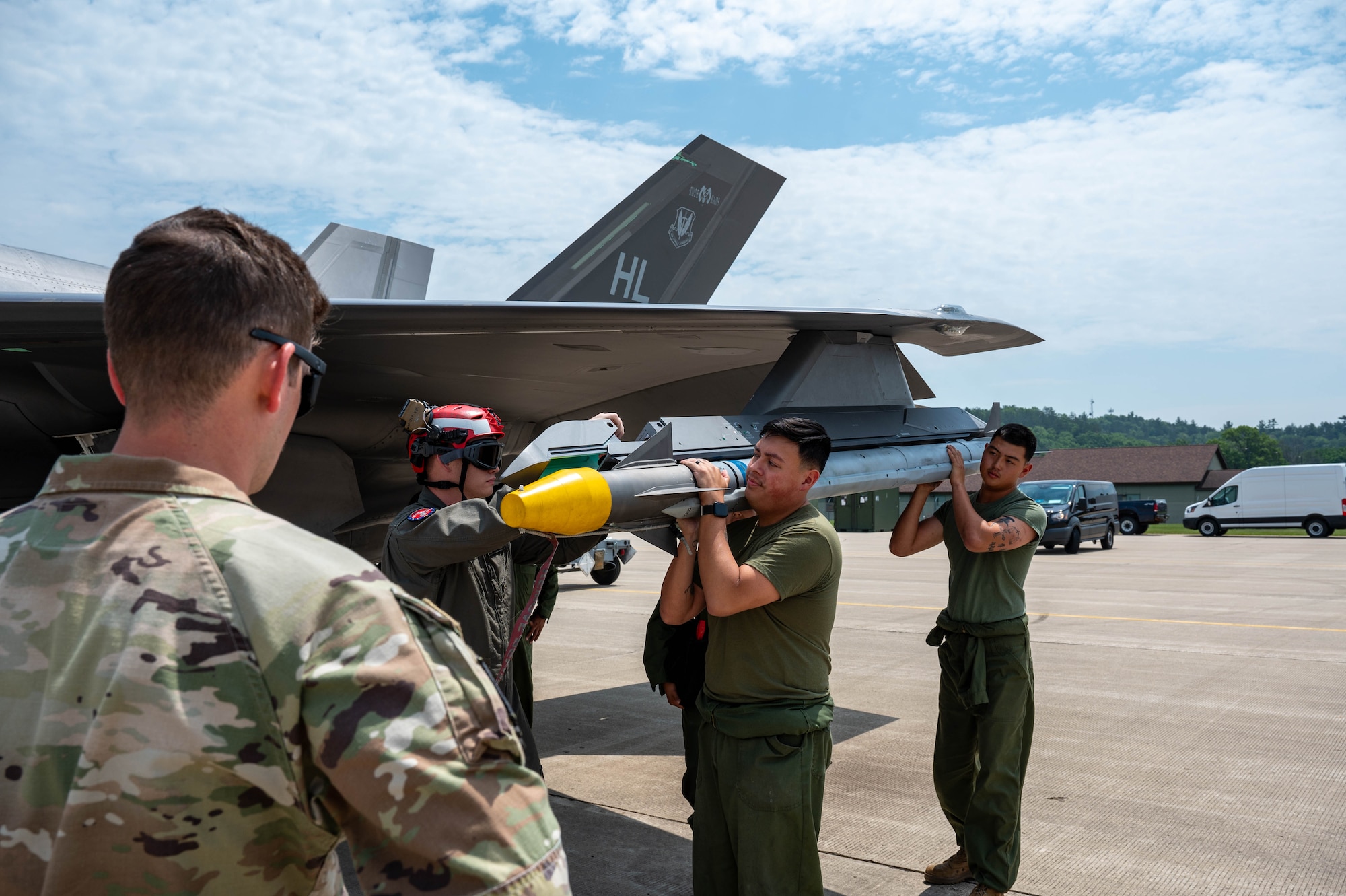 U.S. Marines from the Marine Fighter Attack Squadron 225 ordinances, load a practice missile on an U.S. Air Force 419th Fighter Wing F-35A Lightning during Sentry North exercise at Volk Field Air National Guard Base, Wisconsin, June 11, 2025. Sentry North brought together units from across the Marines, Air and Army National Guard, Reserve, and active-duty forces reinforcing our collective defense capabilities.
