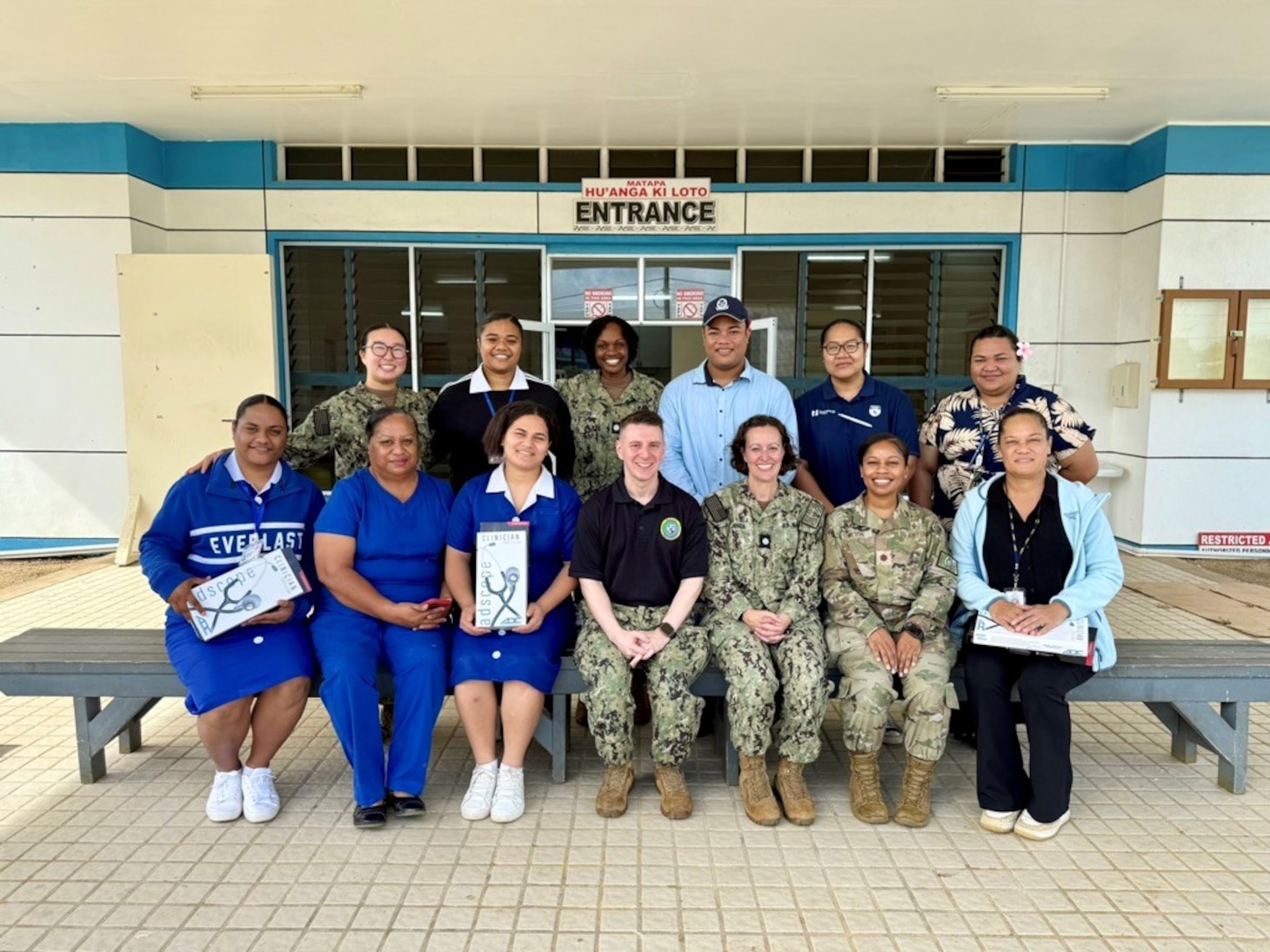 NUKU’ALOFA, Tonga (June 24, 2025) U.S. service members deployed in support of Pacific Partnership 2025 (PP-25), and local healthcare workers at Mu’a Health Centre pose for a group photo during PP-25 in Nuku’Alofa, Tonga, June 24, 2025. Now in its 21st iteration, the Pacific Partnership series is the largest annual multinational humanitarian assistance and disaster management preparedness mission conducted in the Indo-Pacific. Pacific Partnership works collaboratively with host and partner nations to enhance regional interoperability and disaster response capabilities, increase security and stability in the region, and foster new and enduring friendships in the Indo-Pacific. (U.S. Navy photo by Courtesy Asset/Released)