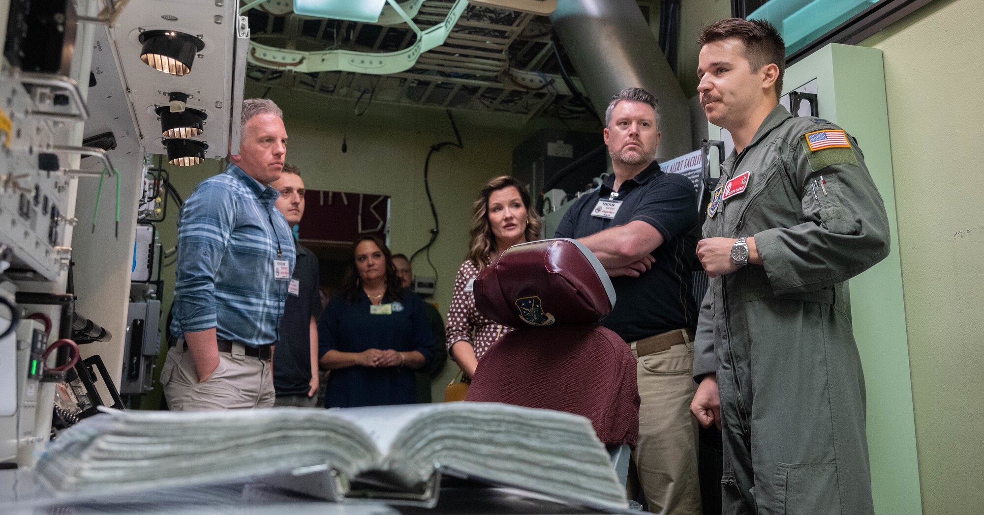 Members of the Association of Defense Communities and Minot Area Chamber Economic Development Corporation receive a tour of a missile alert training facility.