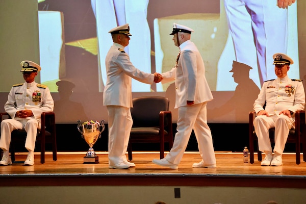Navy Medicine Readiness and Training Command (NMRTC) Twentynine Palms marks a historic transition of leadership during a Change of Command and Retirement Ceremony held July 18, 2025, at the Marine Corps Air Ground Combat Center (MCAGCC) Theater. Capt. Janiese Cleckley relieved Capt. Daniel Clark as commanding officer of NMRTC Twentynine Palms and director of Naval Hospital Twentynine Palms. The event also included a retirement ceremony, as the command honored Clark’s 29 years of distinguished service in Navy Medicine (U.S. Navy photo by Christopher C. Jones, NHTP/NMRTC Twentynine Palms public affairs officer).