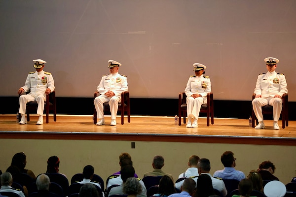 Navy Medicine Readiness and Training Command (NMRTC) Twentynine Palms marks a historic transition of leadership during a Change of Command and Retirement Ceremony held July 18, 2025, at the Marine Corps Air Ground Combat Center (MCAGCC) Theater. Capt. Janiese Cleckley relieved Capt. Daniel Clark as commanding officer of NMRTC Twentynine Palms and director of Naval Hospital Twentynine Palms. The event also included a retirement ceremony, as the command honored Clark’s 29 years of distinguished service in Navy Medicine (U.S. Navy photo by Christopher C. Jones, NHTP/NMRTC Twentynine Palms public affairs officer).