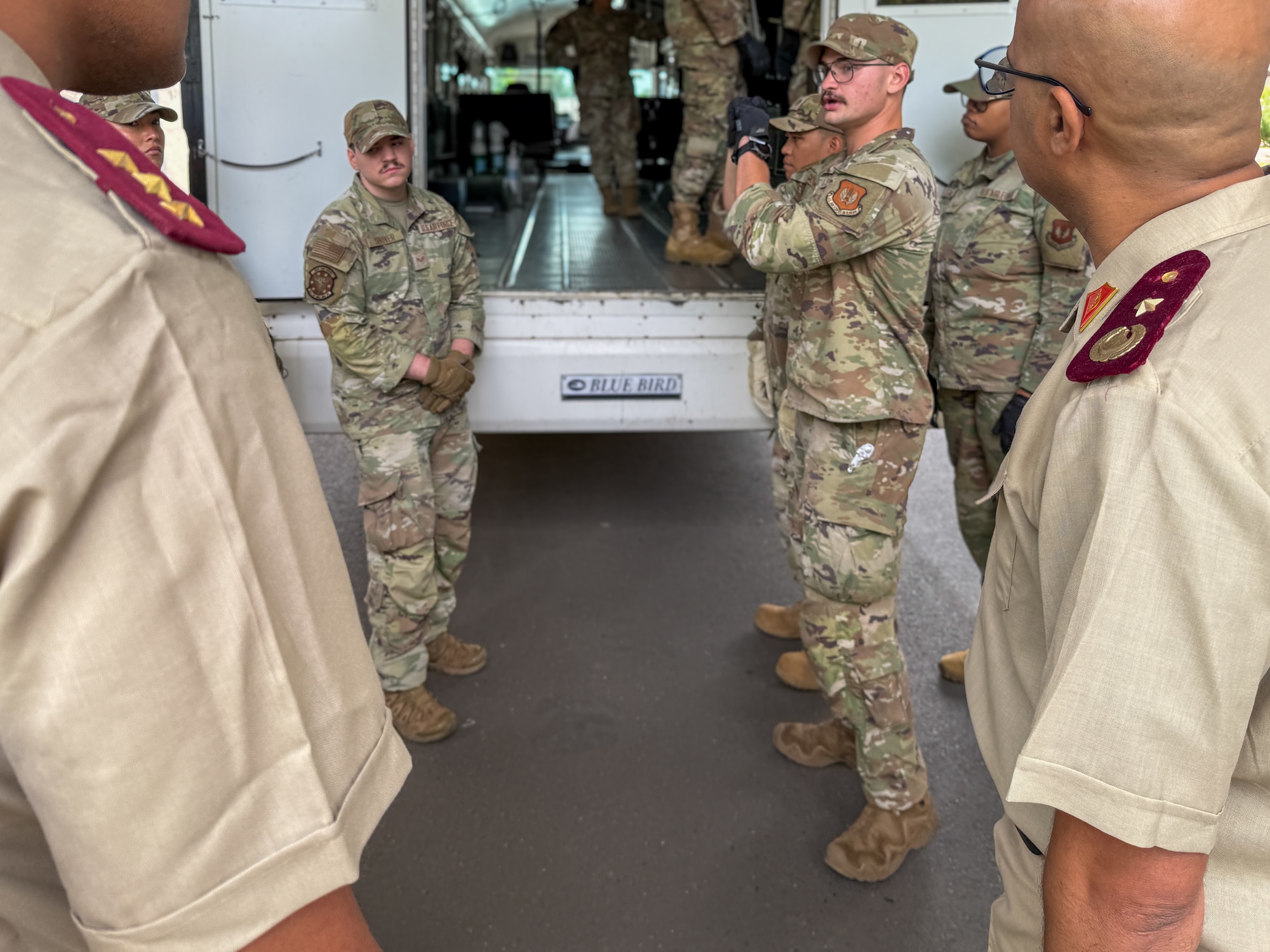 U.S. Air Force Staff Sgt. Jacob Livolsi, 86th Operational Medical Readiness Squadron aerospace medical technician, explains procedures for a medical evacuation bus during an Algerian aeromedical evacuation familiarization visit at Ramstein Air Base, Germany, July 15, 2025. The exchange, led by the U.S. Air Forces in Europe – Air Forces Africa Command Surgeon’s Office of Global Health Engagements and the 86th Aeromedical Evacuation Squadron, provided an opportunity to exchange knowledge and best practices between the U.S. and Algerian medical teams.
