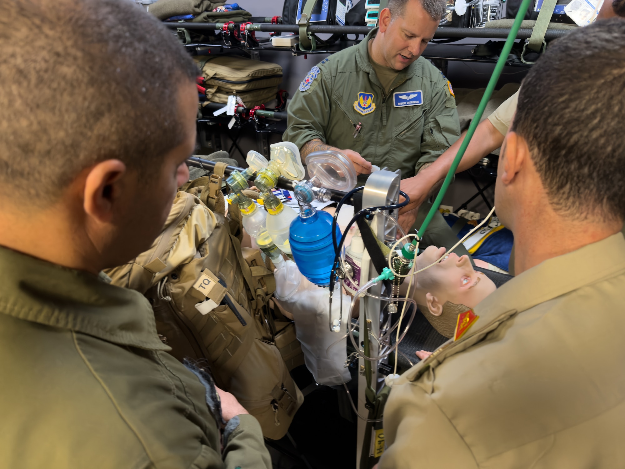 U.S. Air Force Capt. Robert Ostrowski, 86th Aeromedical Evacuation Squadron flight nurse and instructor, demonstrates a medical scenario in the simulation lab during an Algerian aeromedical evacuation familiarization visit at Ramstein Air Base, Germany, July 17, 2025. The visit, led by the U.S. Air Forces in Europe – Air Forces Africa Command Surgeon’s Office of Global Health Engagements and the 86th Aeromedical Evacuation Squadron, provided an opportunity to deepen the cooperative relationship and foster mutual understanding of aeromedical patient care practices.