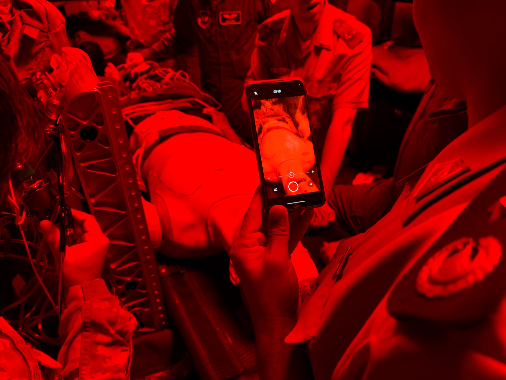 U.S. Air Force and Algerian aeromedical teams treat a robotic mannequin during a clinical simulation demonstration as part of an Algerian aeromedical evacuation familiarization visit at Ramstein Air Base, Germany, July 17, 2025. The visit, led by the U.S. Air Forces in Europe – Air Forces Africa Command Surgeon’s Office of Global Health Engagements and the 86th Aeromedical Evacuation Squadron, provided an opportunity to deepen the cooperative relationship and foster mutual understanding of aeromedical patient care practices.