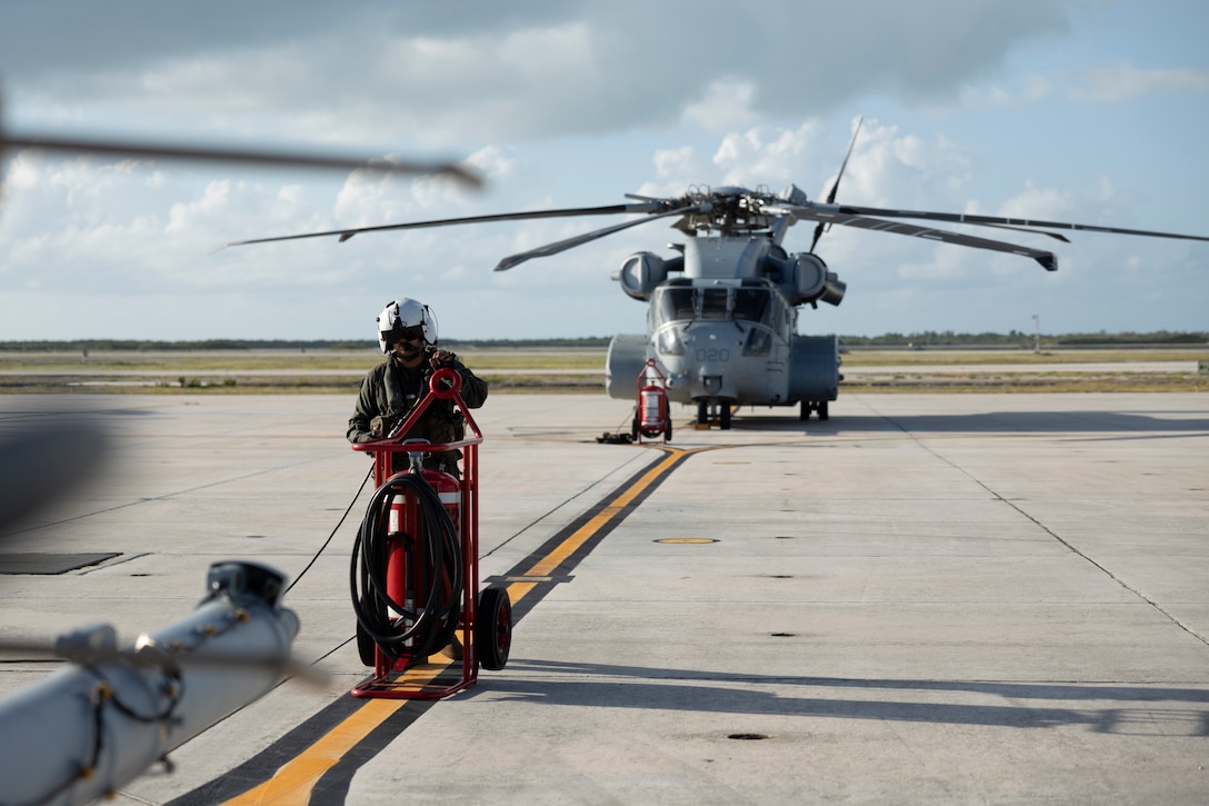 U.S. Marine Corps Lance Cpl. Dakota Dunn, from Kentucky and a CH-53K King Stallion crew chief with Marine Heavy Helicopter Squadron (HMH) 461, conducts preflight checks at Naval Air Station Key West, Florida, July 20, 2025. Marines with 2nd Marine Aircraft Wing and 2nd Distribution Support Battalion are training with elements of the U.S. Army, U.S. Navy, and U.S. Customs and Border Protection to refine humanitarian assistance and disaster relief capabilities while also refining the CH-53K’s ability to support distributed aviation operations in a joint environment. (U.S. Marine Corps photo by Cpl. Mya Seymour)