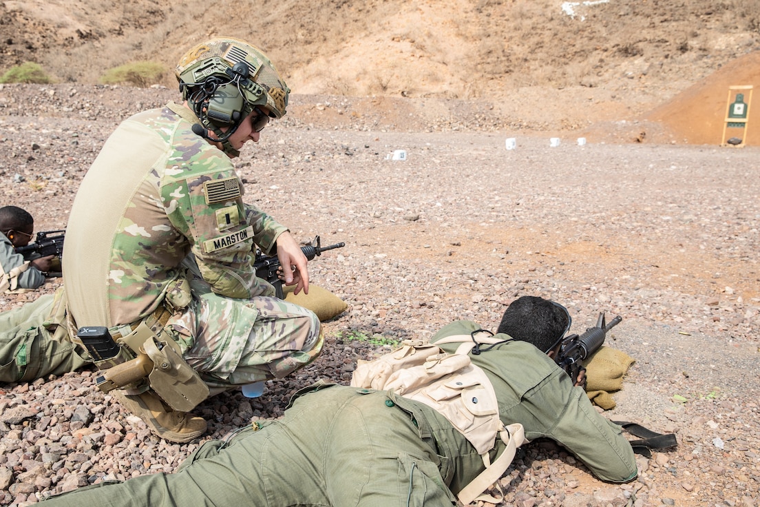 1st Lt. James Marston, a Kentucky Army National Guard Soldier assigned to Task Force Red Dragon, Combined Joint Task Force-Horn of Africa, safeties a zero marksmanship range with the Djiboutian Republican Guard (La Garde Républicaine Djiboutienne), at Arta Range Complex, Aug. 11, 2022.