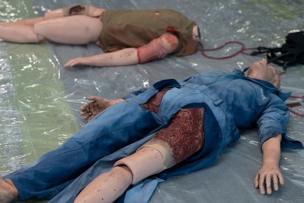 FORT LAUDERDALE, Fla. (July 12, 2025) Manikins are laid out for bleeding simulations and tourniquet application demonstrations during the "Top Doc" event at Nova Southeastern University's Fort Lauderdale campus. Navy Medicine and Navy Recruiting Command partnered with NSU to launch “Top Doc”, a national initiative connecting local medical professionals, educators, and students while highlighting Navy Medicine’s capabilities and career opportunities. (U.S. Navy Photo by Mass Communication Specialist 1st Class Natalia Murillo)