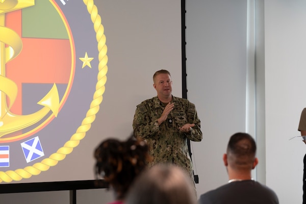 FORT LAUDERDALE, Fla. (July 12, 2025) Cmdr. Adam Brust, an anesthesiologist with Navy Medicine Readiness and Training Command Pensacola, speaks with participants during the "Top Doc" event at Nova Southeastern University's Fort Lauderdale campus. Navy Medicine and Navy Recruiting Command partnered  with NSU to launch “Top Doc”, a national initiative connecting local medical professionals, educators, and students while highlighting Navy Medicine’s capabilities and career opportunities. (U.S. Navy Photo by Mass Communication Specialist 1st Class Natalia Murillo)