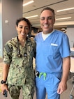 FORT LAUDERDALE, Fla. (July 12, 2025) Lt. Gahen Pendlebury, a full-time out-service medical officer and emergency medicine resident, left, poses for a photo with her former instructor, Dr. Aeyal Oren, a general surgeon and private practitioner in Plantation, during the "Top Doc" event held on at Nova Southeastern University's Fort Lauderdale campus. Navy Medicine and Navy Recruiting Command partnered with NSU to launch “Top Doc”, a national initiative connecting local medical professionals, educators, and students while highlighting Navy Medicine’s capabilities and career opportunities. (U.S. Navy Photo by Mass Communication Specialist 1st Class Natalia Murillo)