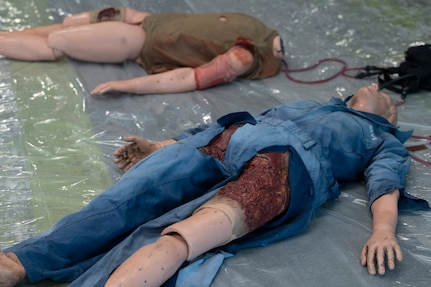 FORT LAUDERDALE, Fla. (July 12, 2025) Manikins are laid out for bleeding simulations and tourniquet application demonstrations during the "Top Doc" event at Nova Southeastern University's Fort Lauderdale campus. Navy Medicine and Navy Recruiting Command partnered with NSU to launch “Top Doc”, a national initiative connecting local medical professionals, educators, and students while highlighting Navy Medicine’s capabilities and career opportunities. (U.S. Navy Photo by Mass Communication Specialist 1st Class Natalia Murillo)