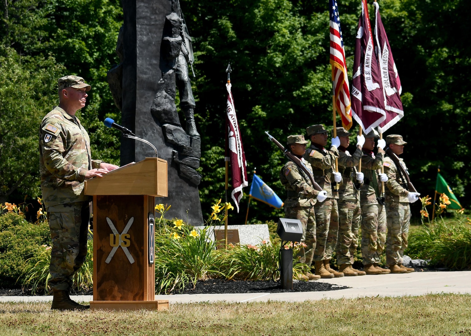 Brig. Gen. James D. Burk, commanding general of the U.S. Army Medical Readiness Command, East, speaks to attendees of the U.S. Army Medical Department Activity (MEDDAC) - Fort Drum change of command ceremony at Fort Drum, N.Y., July 18, 2025.