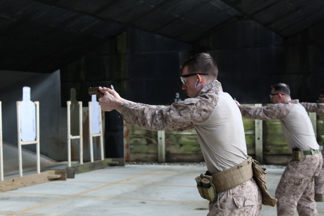 U.S. Marines with the 2d Intelligence Battalion execute pistol drills during the battalion’s squad competition on 6 March 2025.