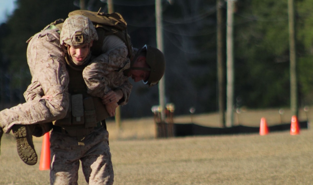 Marines from 2d Intelligence Battalion execute a portion of the Combat Fitness Test in their equipment during the battalion’s squad competition on 6 March 2025.