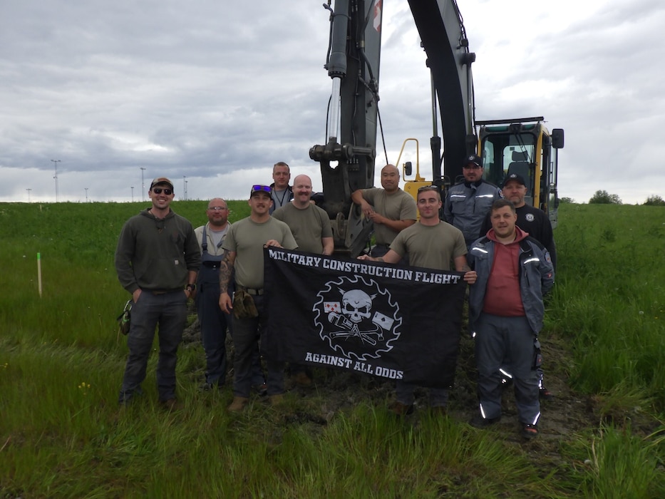 Personnel assigned to the 435th Construction Training Squadron pose for a photo at Andoya Air Station, Norway, Oct. 16, 2024. This was the site of a yearlong project to install five concrete pads used to support communications antennas along with fiber optic cables, a fenceline and a gravel road. (Courtesy Photo)