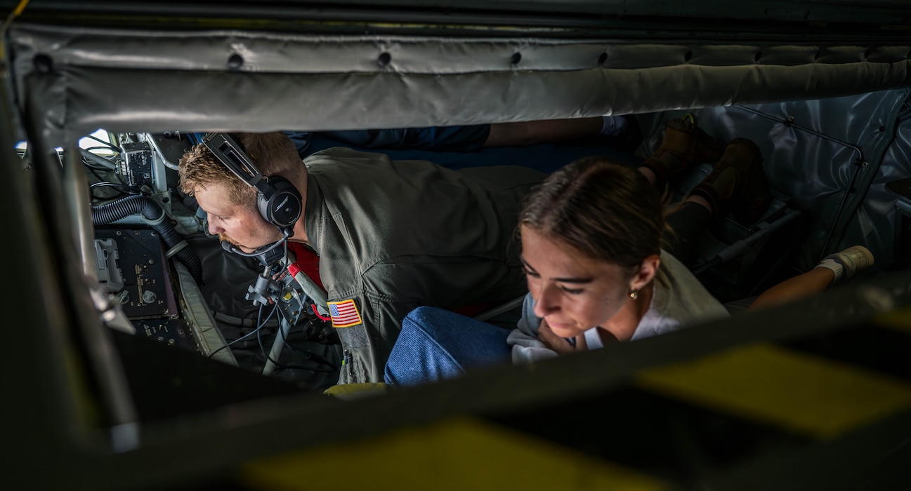 U.S. Air Force Staff Sgt. Ben Hawley, 54th Air Refueling Squadron evaluator boom operator, demonstrates aerial refueling operations to Aim High Flight Academy (AFHA) students in the skies of Texas,
