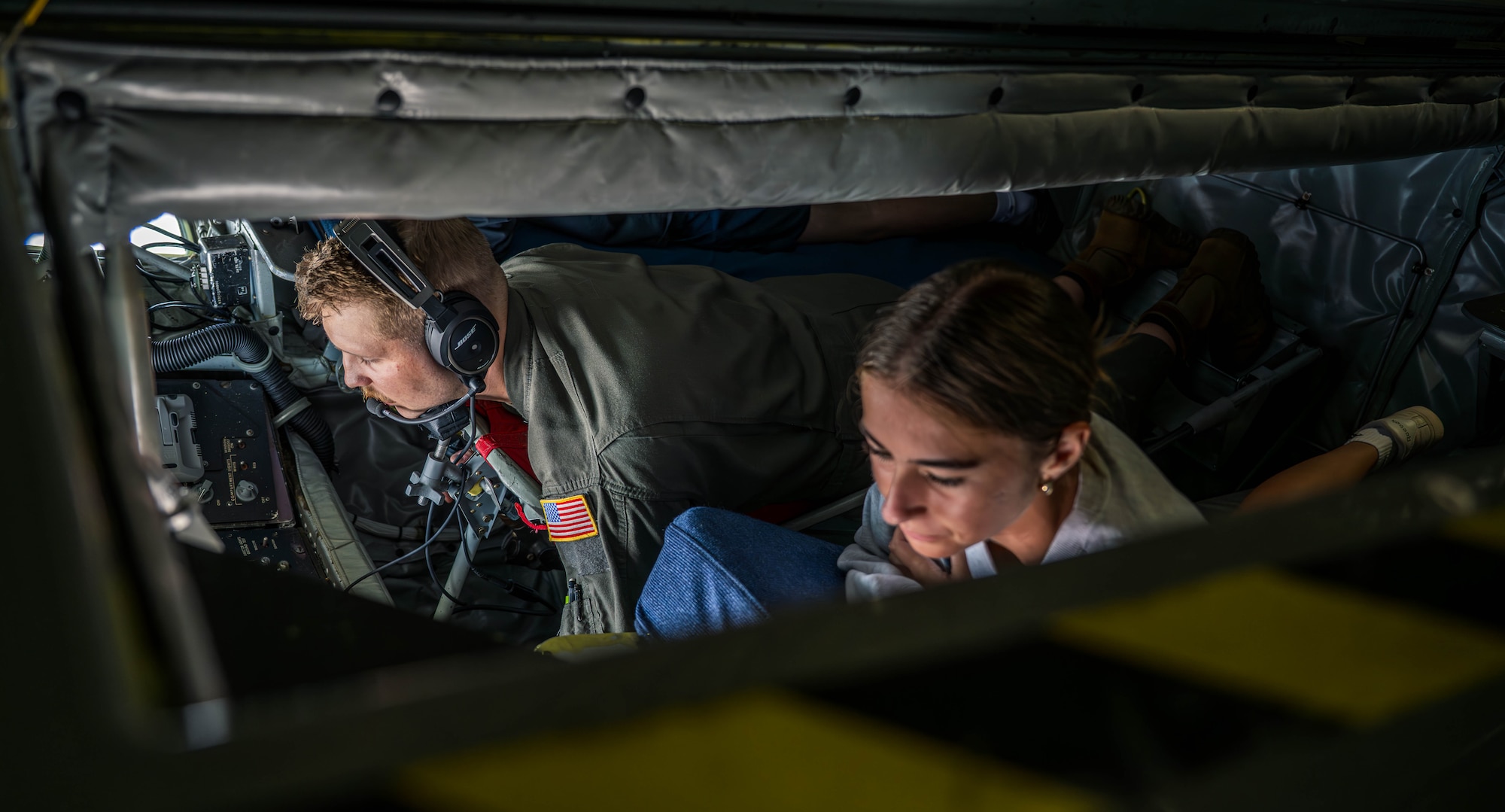 U.S. Air Force Staff Sgt. Ben Hawley, 54th Air Refueling Squadron evaluator boom operator, demonstrates aerial refueling operations to Aim High Flight Academy (AFHA) students in the skies of Texas,
