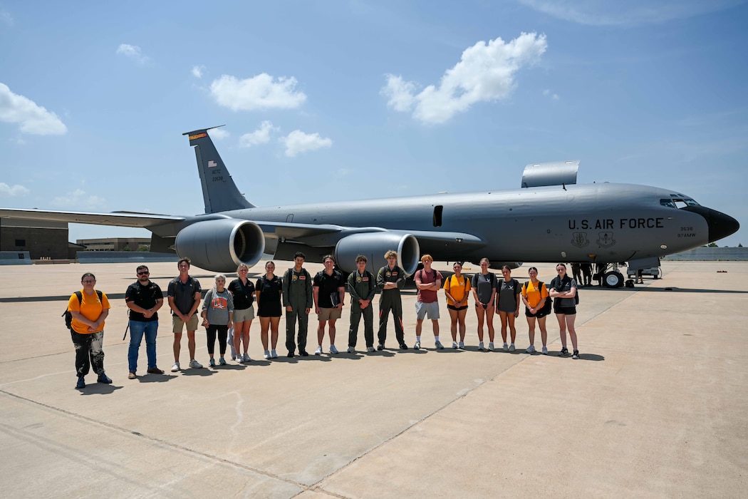 Aim High Flight Academy (AHFA) students gather for a photo at Altus Air Force Base, Oklahoma, July 17, 2025. The AHFA introduces students to Air Force aviation careers and offers up to 15 flight hours during the program. (U.S. Air Force photo by Airman 1st Class Jonah Bliss)