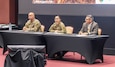 Maj. Gen. Lori Robinson, commanding general of the U.S. Army Aviation and Missile Command, speaks during the AMCOM Town Hall July 14 in the Bob Jones Auditorium on Redstone Arsenal, Alabama. She was joined by AMCOM Command Sgt. Maj. Christopher Doss and Don Nitti, deputy to the commanding general. Robinson addressed workforce concerns associated with the Army Transformation Initiative.