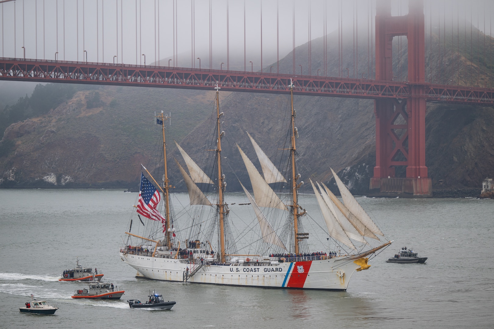 The U.S. Coast Guard Cutter Barque Eagle (WIX-327) sails under the Golden Gate Bridge in the San Francisco Bay, June 25, 2025. The Barque Eagle last visited the San Francisco Bay in 2008. (U.S. Coast Guard photo by Petty Officer 3rd Class Hunter Schnabel)
