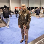 Sgt. 1st Class Williams, Army Band Liaison, poses at recruiting event.