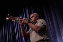 Sgt. 1st Class Williams playing the trumpet