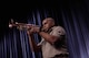 Sgt. 1st Class Williams playing the trumpet