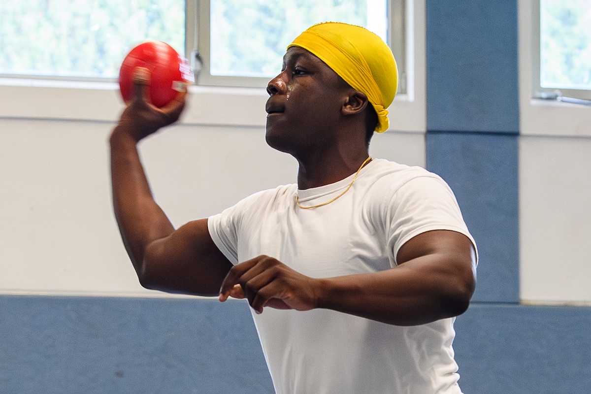 A man throws a dodgeball