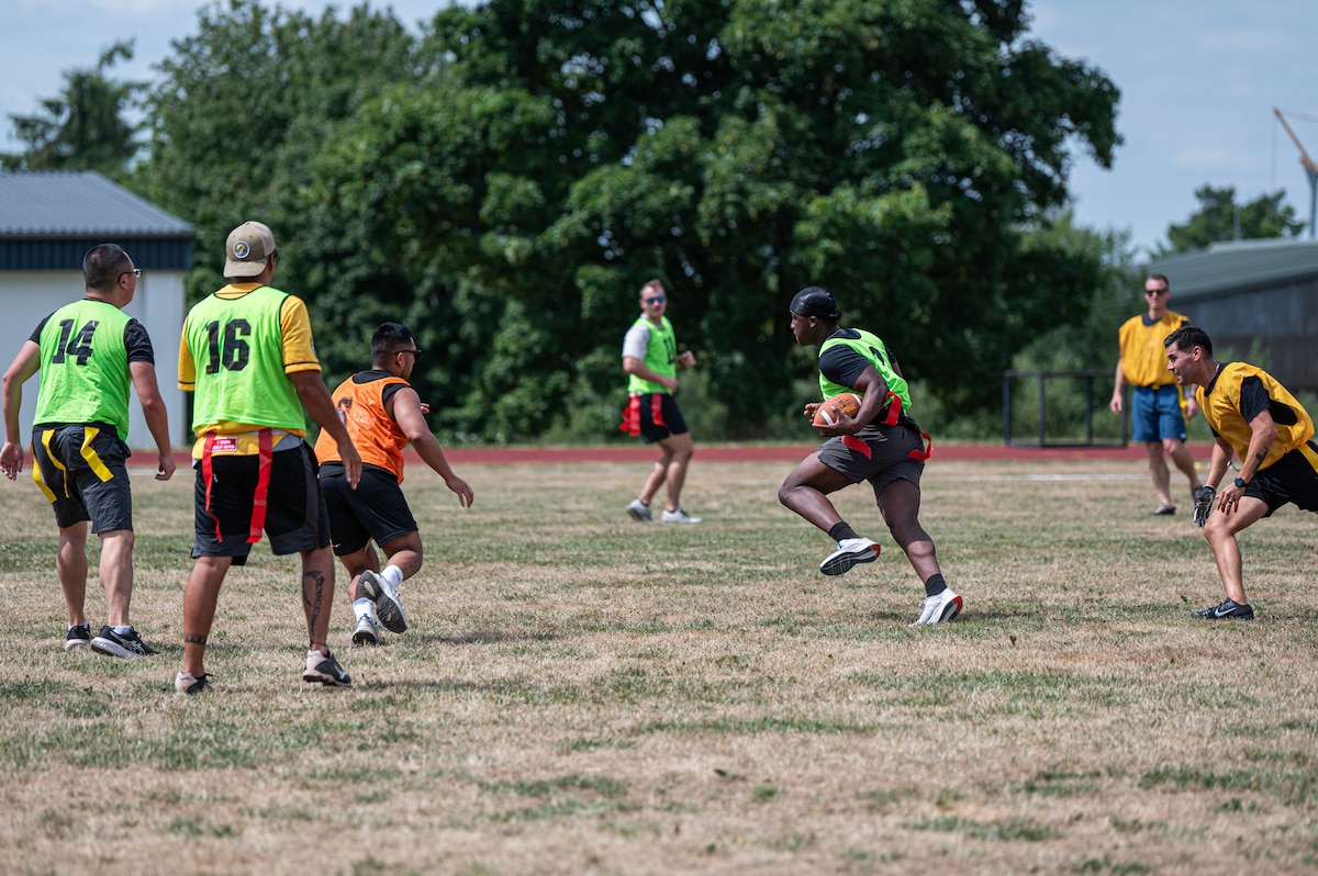 Men playing football.
