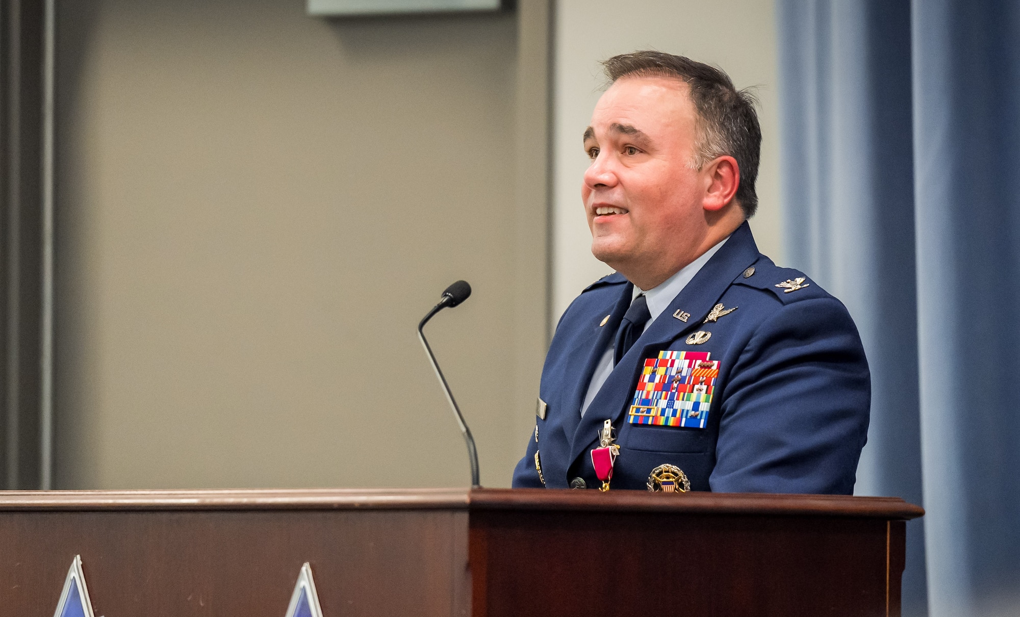 Col Heath Frye gives remarks during his retirement ceremony