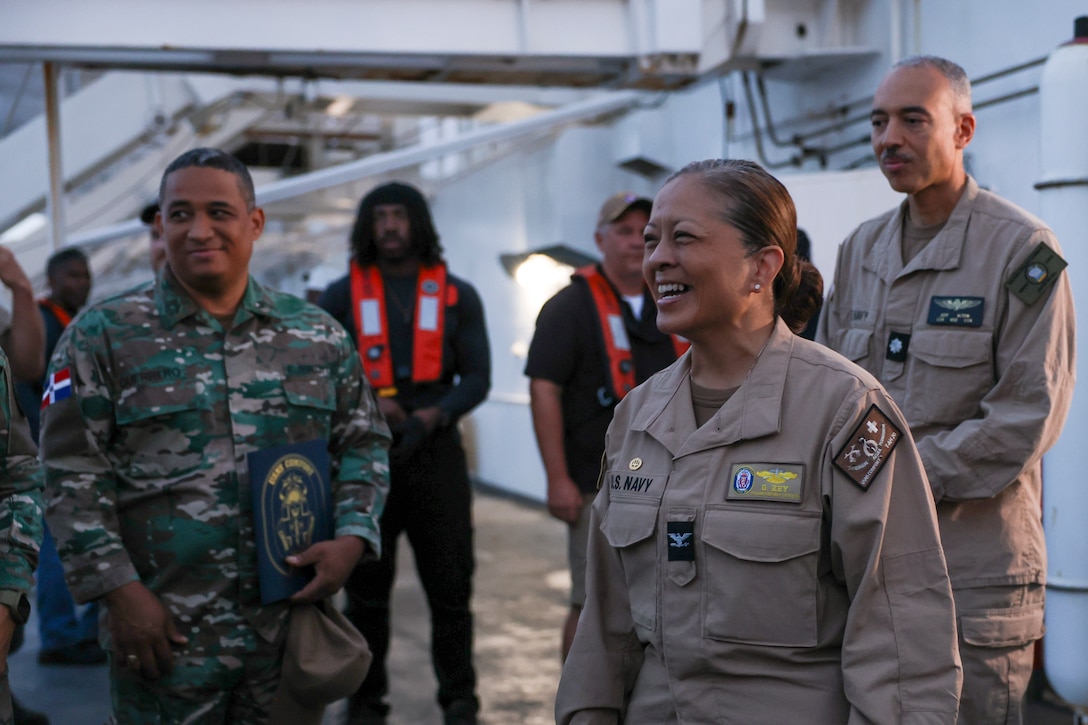 PUERTO PLATA, Dominican Republic (July 20, 2025) Capt. Grace Key, commanding officer, USNS Comfort Medical Treatment Facility, says goodbye to the Dominican Republic medical team as they depart the Mercy-class hospital ship USNS Comfort (T-AH 20) off the coast of Puerto Plata, Dominican Republic during Continuing Promise 2025, July 20, 2025. Continuing Promise 2025 is the 16th iteration of the U.S. 4th Fleet/U.S. Naval Forces Southern Command-led mission since 2007, which aims to foster goodwill, strengthen existing partnerships with partner nations, and form new partnerships between host nations, non-federal entities, and international organizations. (U.S. Navy photo by Mass Communication Specialist 2nd Class Rylin Paul)