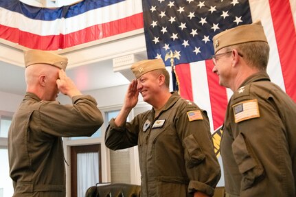 Rear Adm. Michael Spencer, commander, Carrier Strike Group 4, left, salutes Rear Adm. Jeffery Czerewko, special assistant to the director, Navy staff during a change of command ceremony held at Carrier Strike Group (CSG) 4 headquarters on Naval Station Norfolk, July 22.
