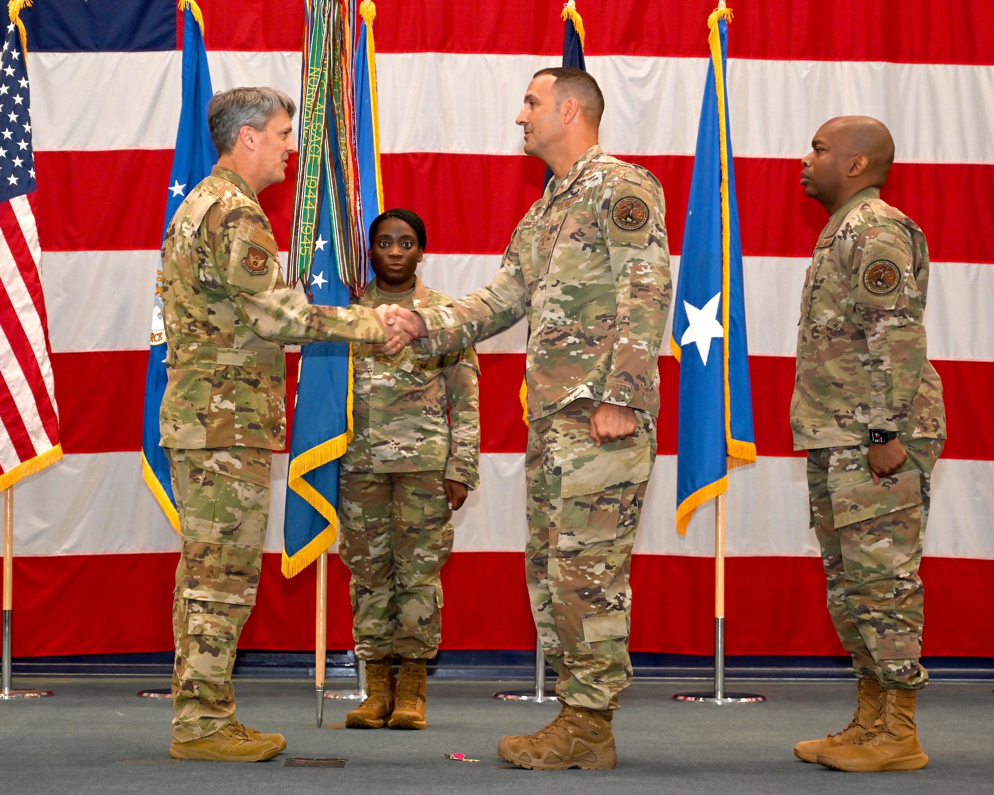 General Armagost congratulates Chief Master Sgt. Wolfgang