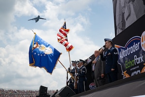 A C-5M Super Galaxy flies over center stage at the NASCAR Cup Series Autotrader EchoPark Automotive 400 race held at Dover Motor Speedway, Dover, Delaware, July 20, 2025. Team Dover members participated in pre-race festivities which included presenting of the Colors by the Dover Air Force Base Honor Guard and the singing of the national anthem by U.S. Air Force Senior Airman Nolan Kuhn, 436th Operations Support Squadron executive assistant. (U.S. Air Force photo by Airman 1st Class Liberty Matthews)