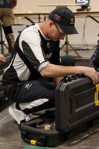 U.S. Army Staff Sgt. Coty Tuck puts away his air rifle at the precision air event during the 2025 Department of Defense Warrior Games at Colorado Springs, Colorado, July 20, 2025.