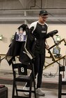 U.S. Army Staff Sgt. Coty Tuck removes his shooting table after the precision air event (air rifle) during the 2025 Department of Defense Warrior Games at Colorado Springs, Colorado, July 20, 2025.
