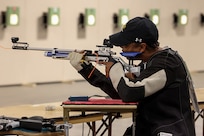 U.S. Army Capt. Channda Mitchell takes aim at her target during the precision air event (air rifle) at the 2025 Department of Defense Warrior Games at Colorado Springs, Colorado, July 20, 2025.