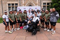 The Acting Assistant Secretary of the Army for Manpower and Reserve Affairs, Mr. Derrick M. Anderson, poses with Team Army athletes during the 2025 Department of Defense Warrior Games at Colorado Springs, Colorado, July 19, 2025.