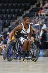 U.S. Army Staff Sgt. Allaijah Churchwell moves down the court during a wheelchair basketball game at the 2025 Department of Defense Warrior Games at Colorado Springs, Colorado, July 20, 2025.