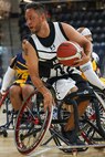 U.S. Army Retired Spc. Anthony Farve turns up court during a wheelchair basketball game against Team Navy at the 2025 Department of Defense Warrior Games at Colorado Springs, Colorado, July 20, 2025.