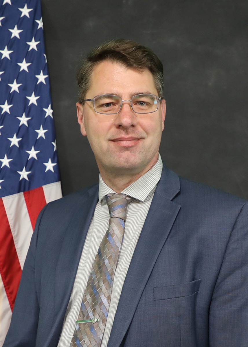 This is the official portrait of Mark D. Benedict, a member of the Scientific and Professional Cadre of Senior Executives.