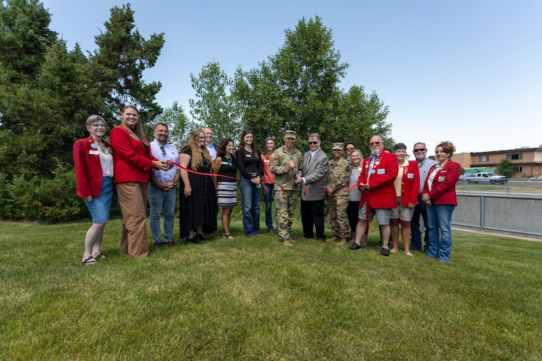 Sheridan Mayor Richard Bridger (right) and Col. Robert Newbauer (left), commander of the U.S. Army Corps of Engineers Omaha District, cut the ceremonial ribbon July 10, 2025, marking the completion of the first phase of the Little Goose Creek ecosystem restoration project in Sheridan, Wyo.