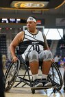 U.S. Army Sgt. Jimmy Candelario listens to instructions during a wheelchair basketball game at the 2025 Department of Defense Warrior Games at Colorado Springs, Colorado, July 20, 2025.
