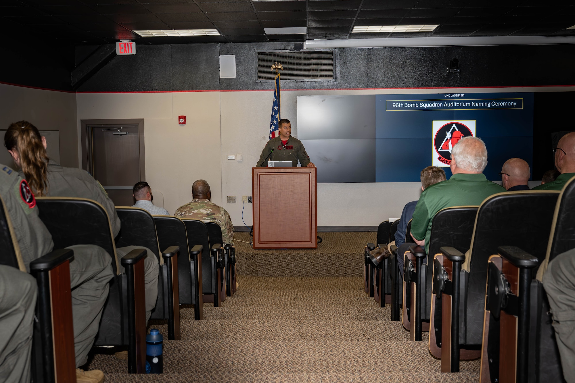 U.S. Air Force Lt. Col. Matthew Dougherty, 96th Bomb Squadron commander, shares remarks